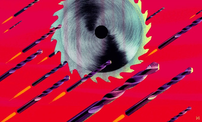 A power saw rotary blade cutting through a red background.