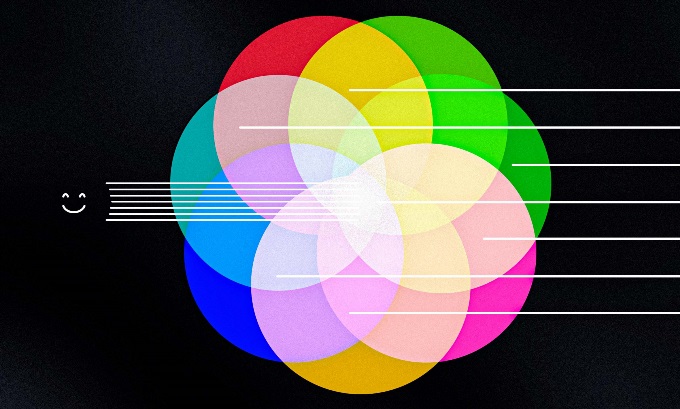 A kaleidoscope of colors with a smiley face to represent unity.
