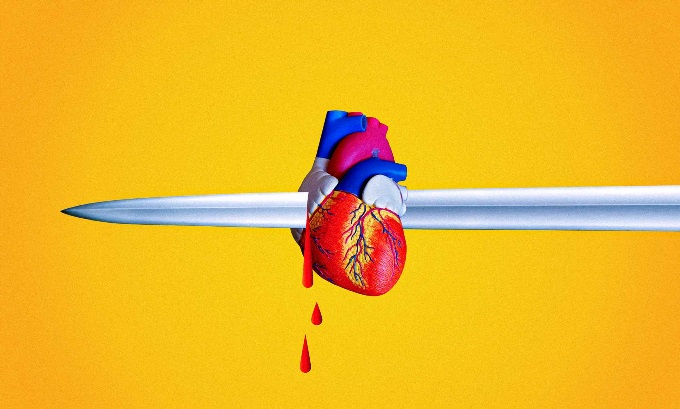 An anatomically correct heart stabbed in the middle by a sword.