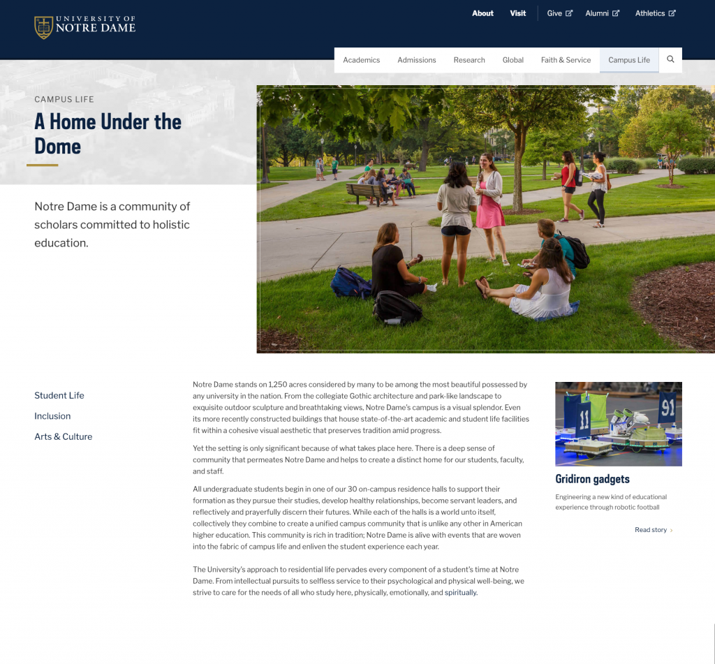 The University of Notre Dame Campus Life page. There is a large picture of students sitting outside on the grass. Beneath the image is a long wall of text that has more details about the campus. 